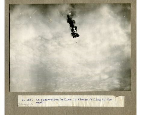 PHOTOGRAPHS, WORLD WAR I. Two albums containing 38 mounted press photographs of the First World War, including photographs ca