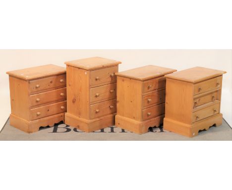 A set of three modern pine bedside chestsWith three short drawers 50cm wide; 50cm high, and another similar (4)