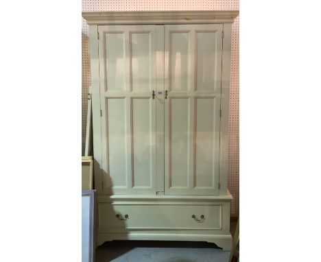 Laura Ashley a modern cream painted two door wardrobe with single drawer base130cm wide; 202cm high; 61cm deep good overall c