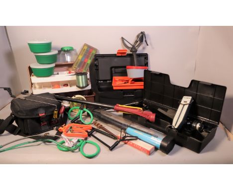 Fishing equipment; a large box of mixed fishing tackleTo include a cased fishing kit, a Daiwa travel spinning rod, two tackle