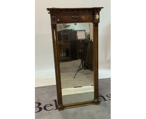 A 19th century gilt framed pier wall mirrorFlanked by reeded columns, 65cm wide; 129cm high