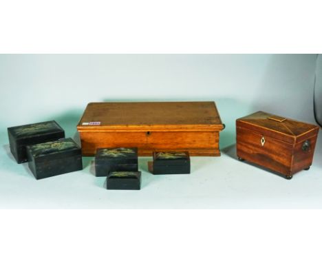 A 19th century oak rectangular box43cm wide, a mahogany sarcophagus tea caddy, 19cm wide and a nest of five Japanese lacquer 
