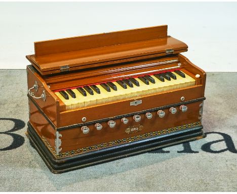 A Bina walnut cased HarmoniumCirca 1980s, old narks and scratches to the case&nbsp;