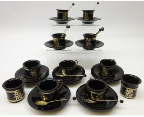 Set of twelve Chinese pressed black glass coffee cups and saucers with similar style coffee bean spoons  Condition Report Cli