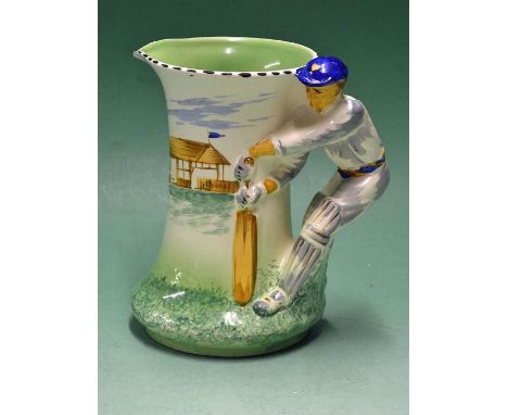 Early Burleigh ware cricket water jug - the handle modelled in the form of a cricket batsman^ white and green background - c/