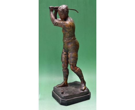 A large French spelter golfing figure of a young man playing a golf shot c1900 - signed by the sculptor George Vacossin (1870