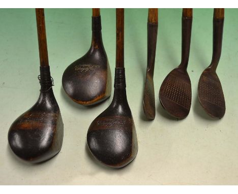 6x Geo Johnson^ West Runton golf clubs including 2x stained persimmon drivers and a stripe topped spoon^ 2 iron with Tom Stew