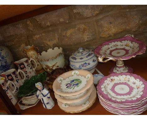 A quantity of 19th century and other ceramics including a set of three graduated jugs with blue, red and gilt decoration, a c