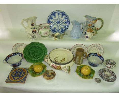 A collection of 19th century ceramics including an ironstone china jug of octagonal form with chinoiserie decoration and serp