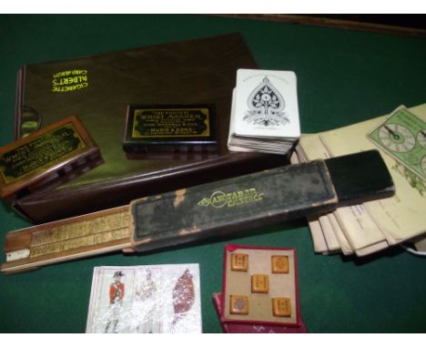 A good quality set of vintage American playing cards, manufactured by A Dougherty, two antique 'Foster whist markers' by Chas