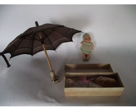An unusual vintage boxed Nortons double sided Baby Face Soap in original packaging with swaddling flannel, a miniature Armand