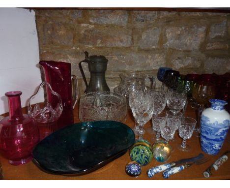 A collection of glassware to include five Harlequin hock wines, a cranberry glass carafe, a turquoise studio glass bowl with 