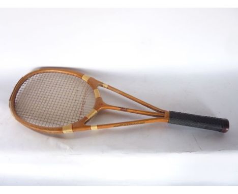 A vintage Hazel's streamline timber framed badminton racket with painted detail