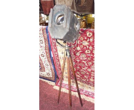 A vintage industrial steel framed light, the octagonal housing accommodating a circular lens with plaque to reverse reading -