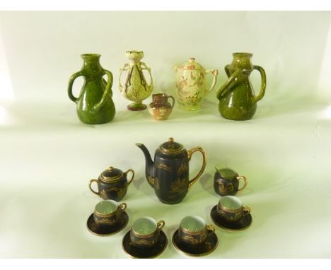 A collection of oriental black ground eggshell porcelain coffee wares with gilt landscape decoration comprising coffee pot, c