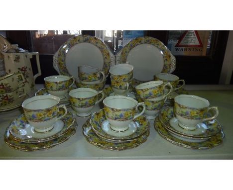 A collection of Royal Albert Mary's Garden pattern tea wares with printed floral chintz style border comprising milk jug, sug