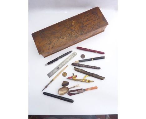 A small collection of vintage fountain pens, a caddy spoon with silver bowl and mother-of-pearl handle, etc