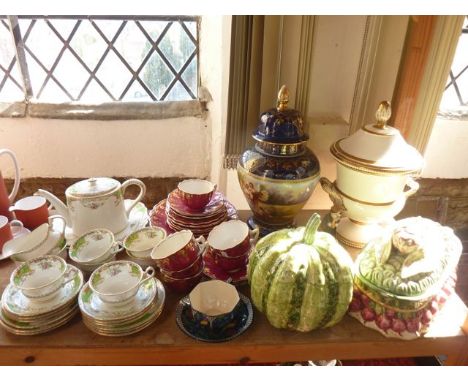 A collection of ceramics including a 19th century two handled white ground urn shaped vase and cover with gilded decoration, 