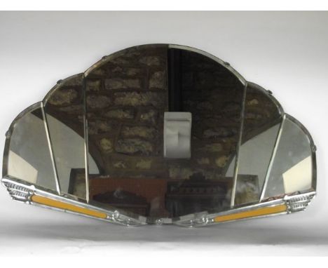 A D shaped wall mirror in the Art Deco manner with five divisional bevelled glass plate set within a stylised embossed chrome
