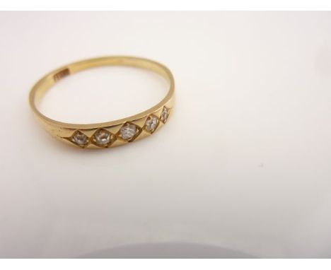 A diamond ring, set with five old-cut diamonds, in 18ct gold, size W