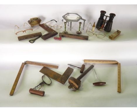 A small miscellaneous collection to include vintage carpenter's set squares, folding timber rulers, a brass mounted spirit le