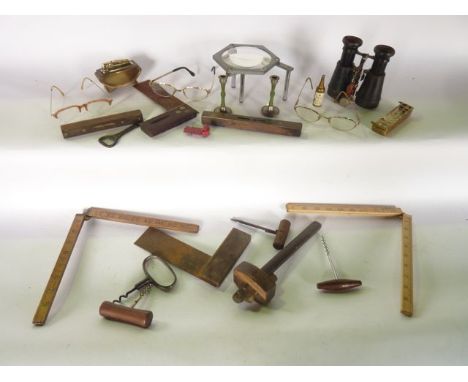 A small miscellaneous collection to include vintage carpenter's set squares, folding timber rulers, a brass mounted spirit le