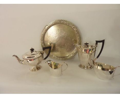 A George V silver coffee pot, James Dixon & Sons Ltd, Sheffield, 1913, the plain oval body highlighted with two floral bands,