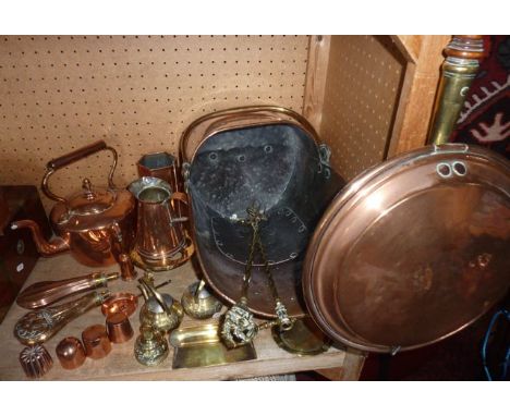 A selection of copper and brassware to include a 19th century copper coal scuttle, teapot, pink measure, a copper vessel of h