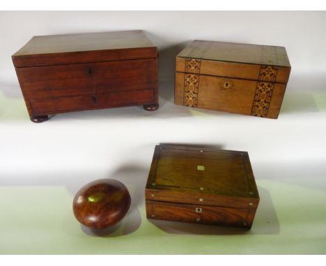 A 19th century mahogany veneered box of rectangular form with hinged lid and single drawer, set above four bun supports with 