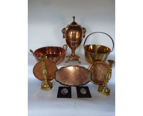 A good quality 19th century copper urn shaped lidded vessel with goat mask finial set above two beast mask loop handles, rais