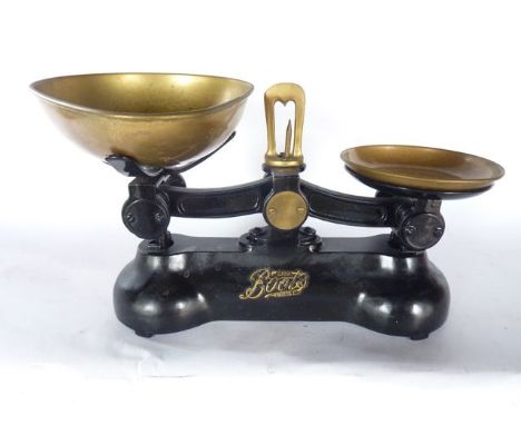 A vintage set of 'Boots', cast iron and brass kitchen scales