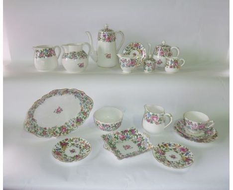 An extensive collection of Crown Staffordshire tea, coffee and other wares including teapot, coffee pot, five jugs, sugar bow