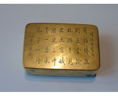 A small late 19th/early 20th Century Chinese lidded brass box of rectangular form (probably for seal paste).The lid bearing a