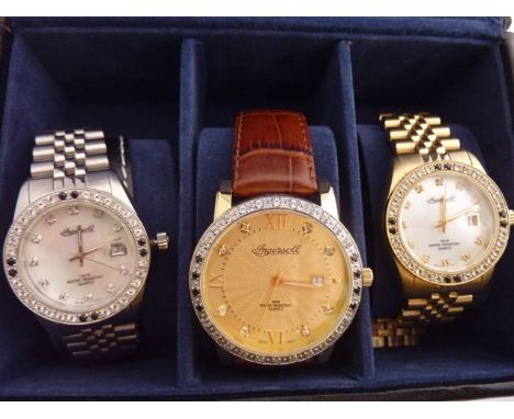 A collection of three wristwatches, Ingersoll, two with mother-of-pearl dials, contained in a leather bound box