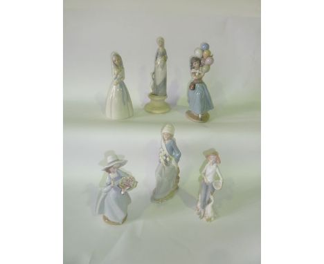 A Lladro Daisa model of a young girl balloon seller together with two further Lladro Daisa figures, one of a young girl with 