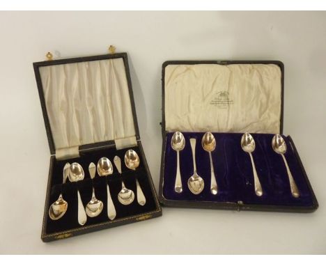 A cased set of six George V silver coffee spoons, Harrison Brothers & Howson, Sheffield, 1918, 76g in total; and a cased set 