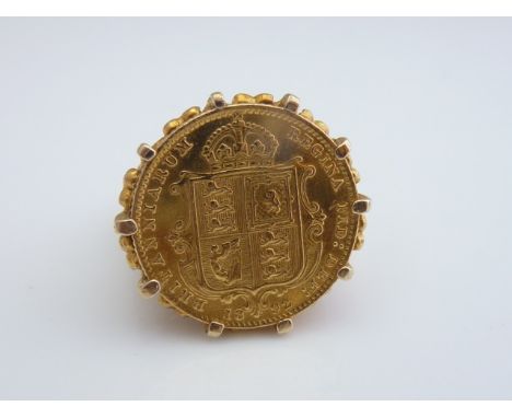 A half sovereign ring, 1892, mounted in 9ct gold, with pierced scrolling shoulders, size O 1/2