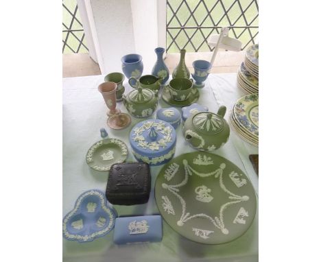 A quantity of Wedgwood Jasperwares including green ground teapot, covered sugar bowl, milk jug, cup and saucer, two vases, pl