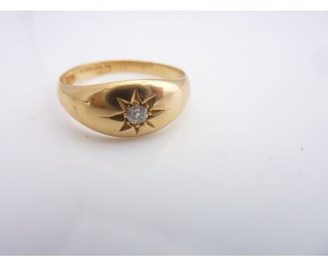 A gypsy diamond ring, the central star motif inset with an old-cut diamond, Birmingham, 1909, in 18ct gold, size T 1/2 