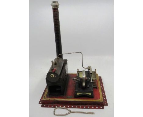 A Doll et Cie vintage tinplate live steam horizontal engine, 23 x 19cm x 30.5cm high. Marked DC Made in Germany.