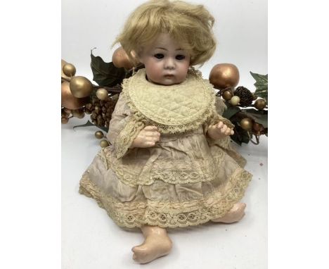 Kammer &amp; Reinhardt 115 Art Character series 10” bent limb antique Baby doll c 1910., with original shop clothing in which