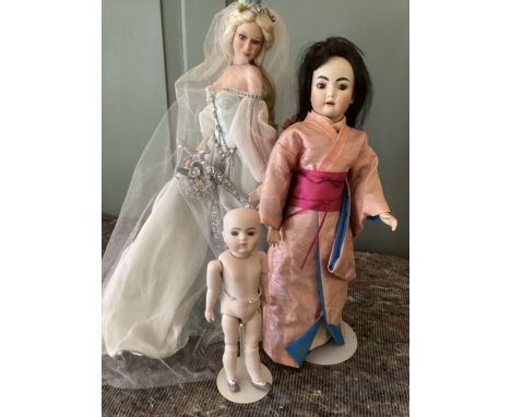 Collection of Porcelain Artist dolls to include 18”/17” and a 10” all bisque child doll. The oriental and he fairy queen are 