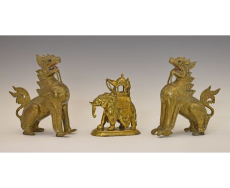 Pair of Chinese cast brass figures of Kylin, 20.5cm high together with an Indian brass figure of an elephant with howdah, 15.
