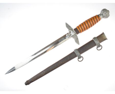 Second pattern German Luftwaffe dagger, pommel decorated with oak leaves and swastika, wire bound orange plastic grip, cross 