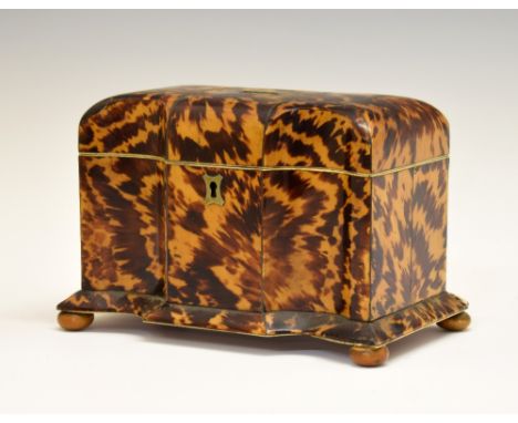 19th Century tortoiseshell serpentine front tea caddy, having white metal stringing, the hinged cover opening to reveal a par