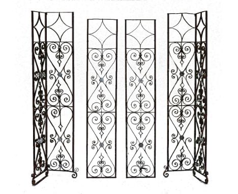 Four 19th Century wrought iron architectural canopy supports, two being corner pieces together with two conforming flat piece