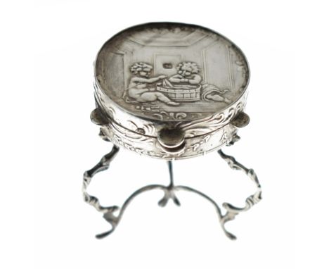 Late 19th Century Dutch silver model of a drum top occasional table having a hinged cover, embossed decoration depicting a pa
