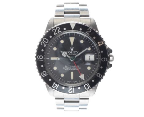 Rolex - G.M.T. - Master Oyster Perpetual automatic chronometer, ref: 1675/0, the stainless steel case with a black rotating b