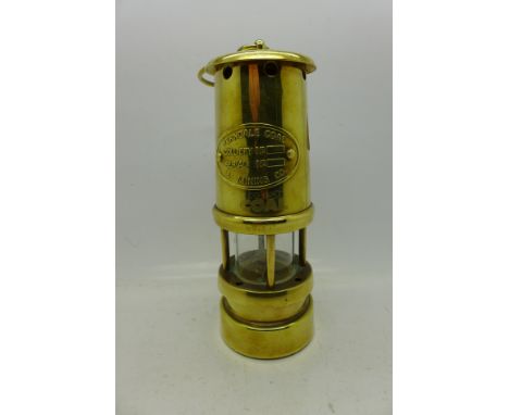 A brass miner's lamp, British Coal, 17cm