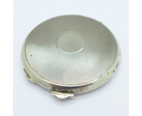 A silver compact
